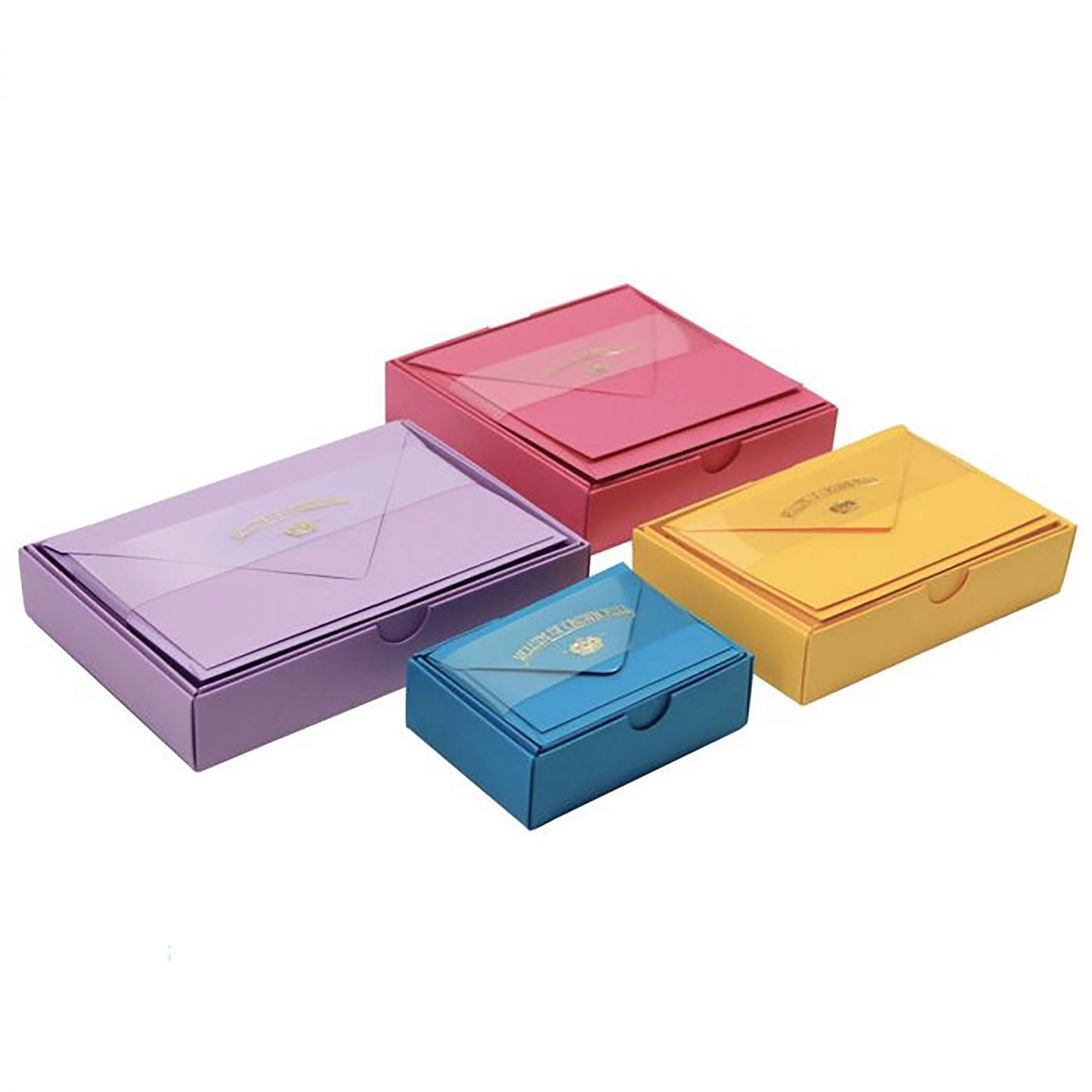 Crown Mill Color Collection - mehrere farbige Boxen mit Karten und Umschlägen, arrangiert in Lila, Pink, Gelb und Türkis.
